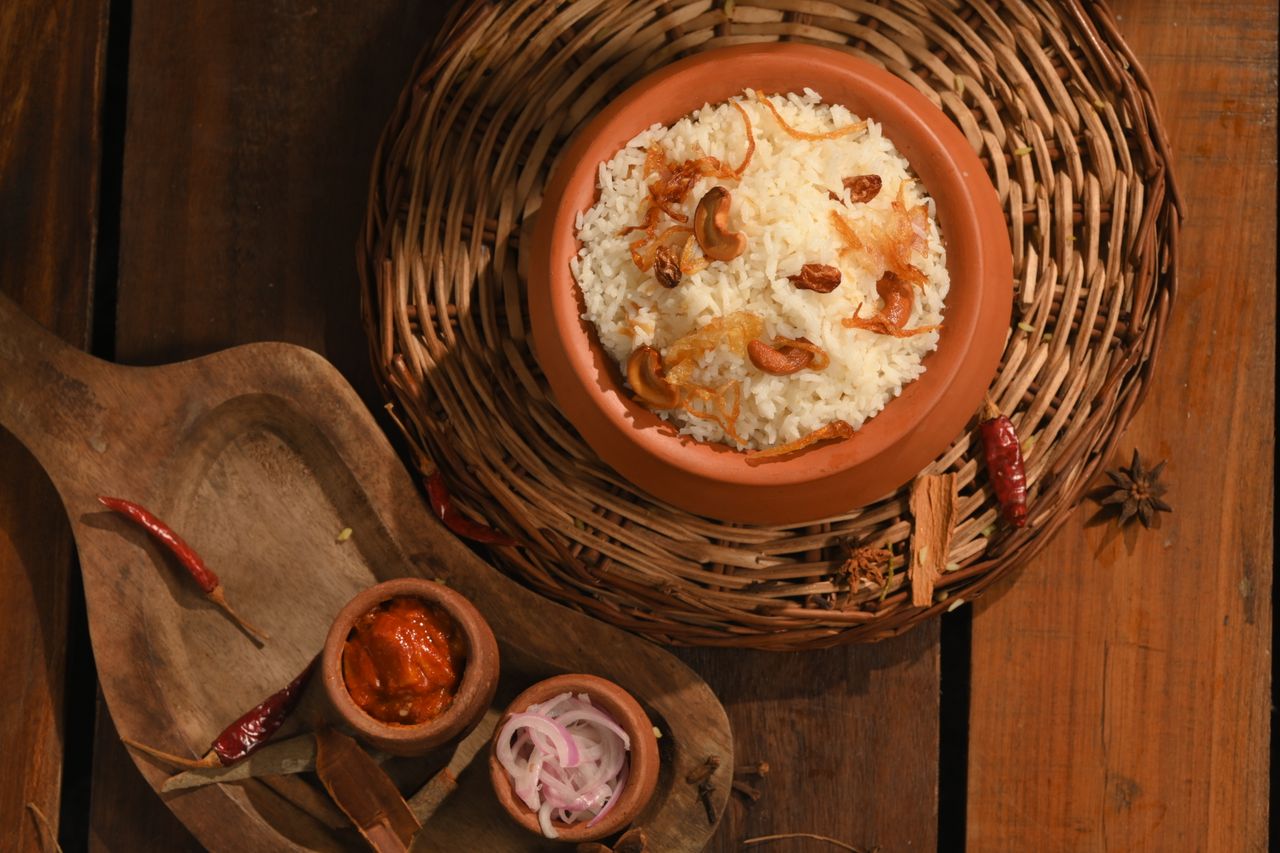 Biryani served in a traditional pot
