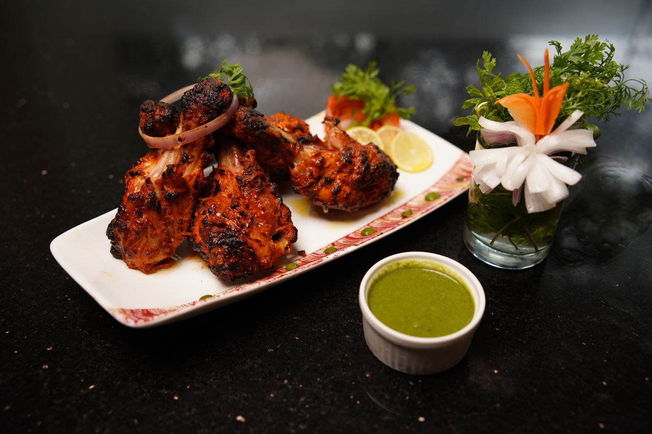 Chicken ghee roast, a house speciality